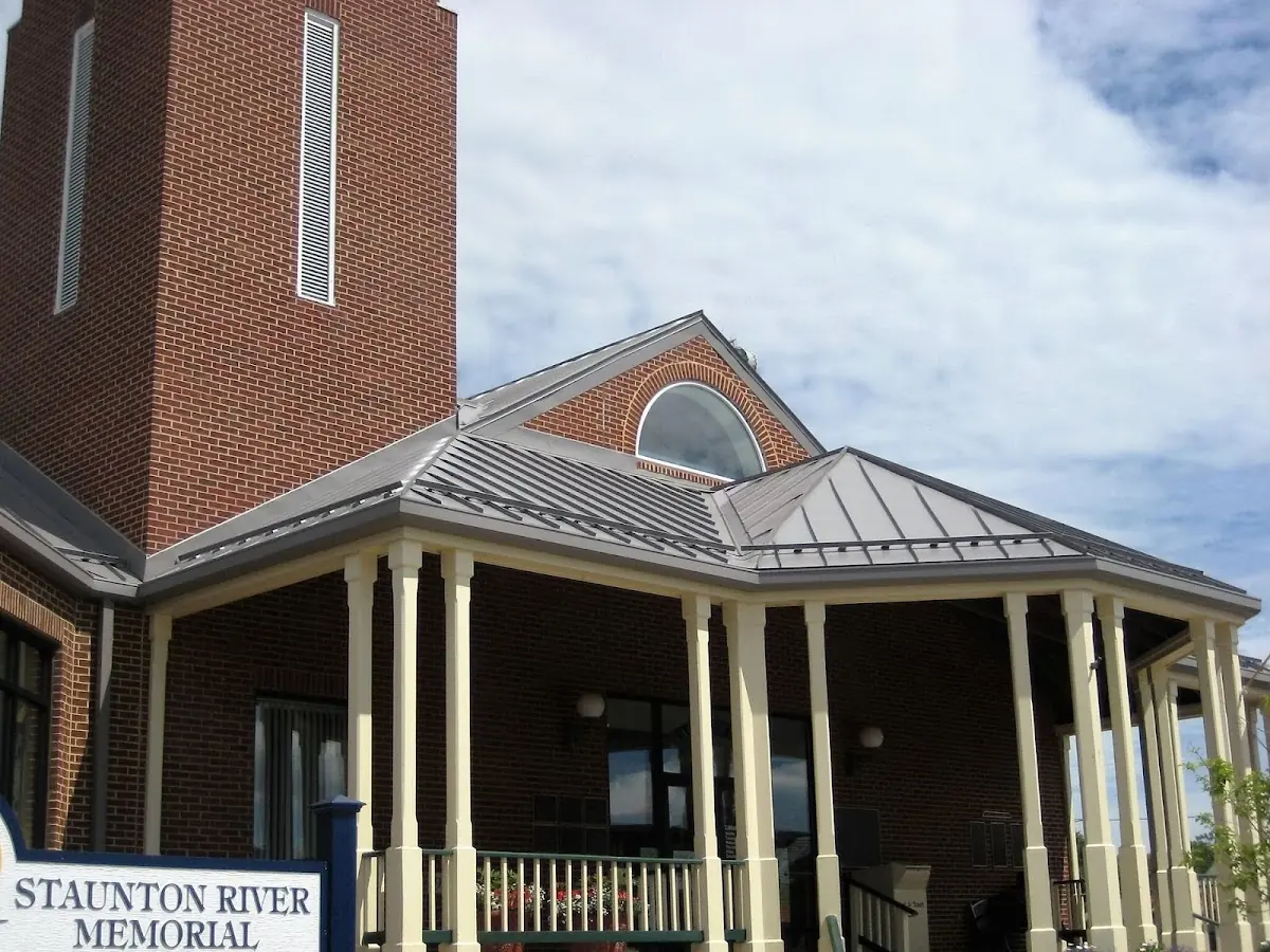 Skilled roofing craftsmen working on a residential roof in Lenhartsville